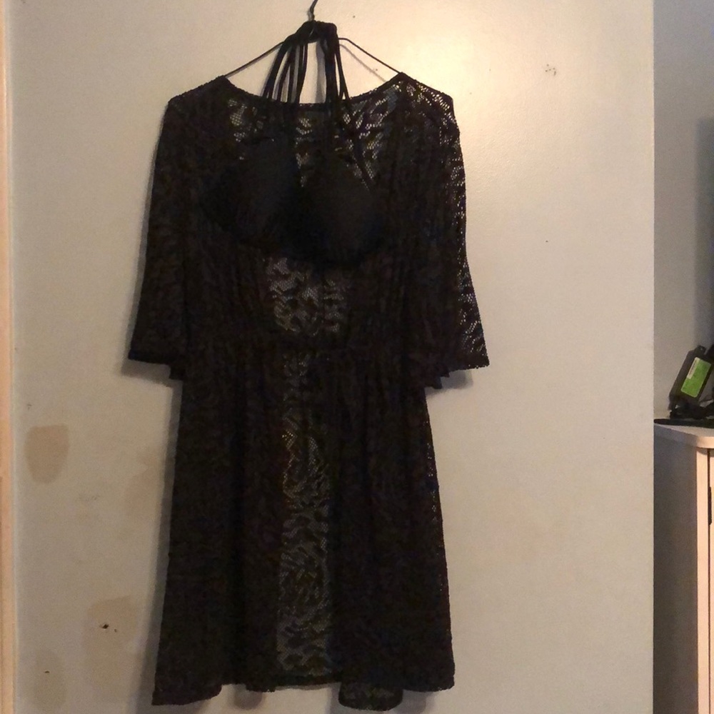 A bikini top and a bathing suit robe.